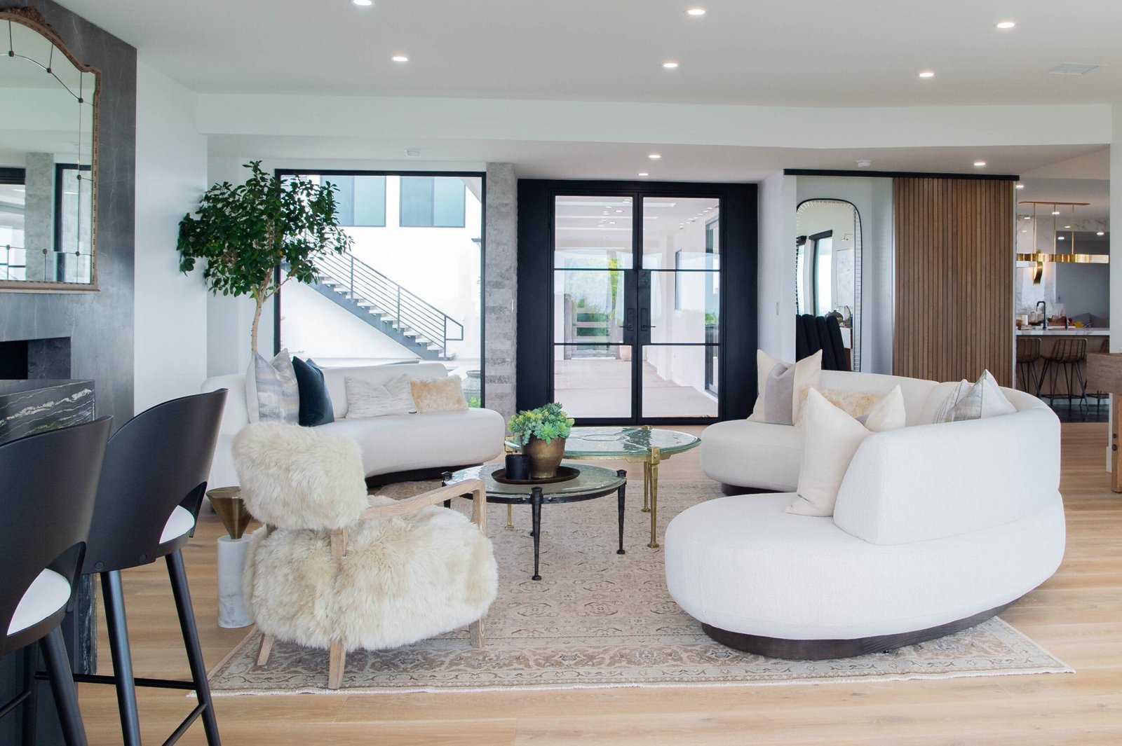 Remodeled living room in Corona del Mar, featuring a modern building design and stylish interior.